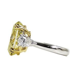 Alternative view of Oval Fancy Intense Yellow Diamond Trinity